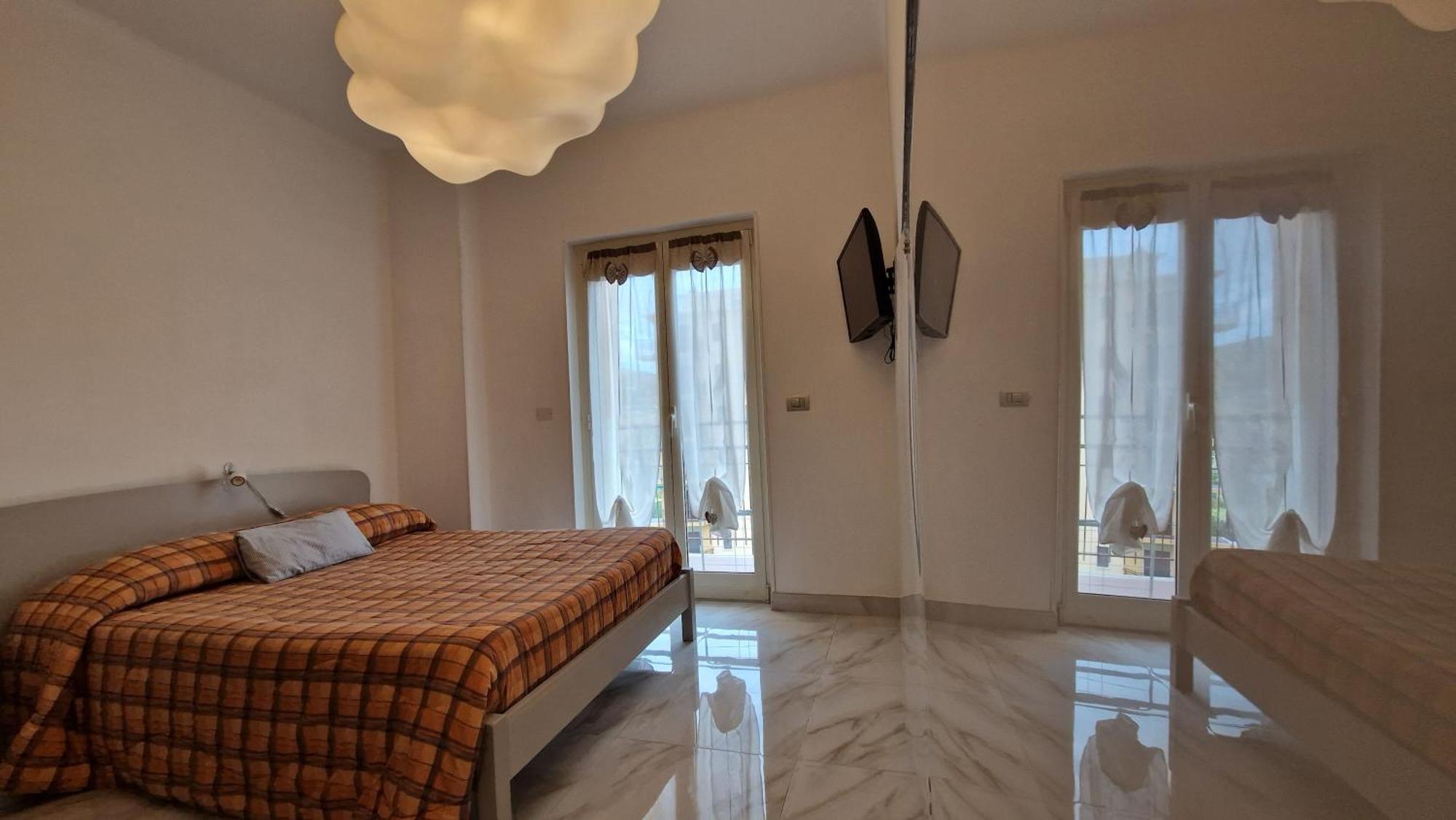 Olimpia Apartment Арма ди Таджия Екстериор снимка